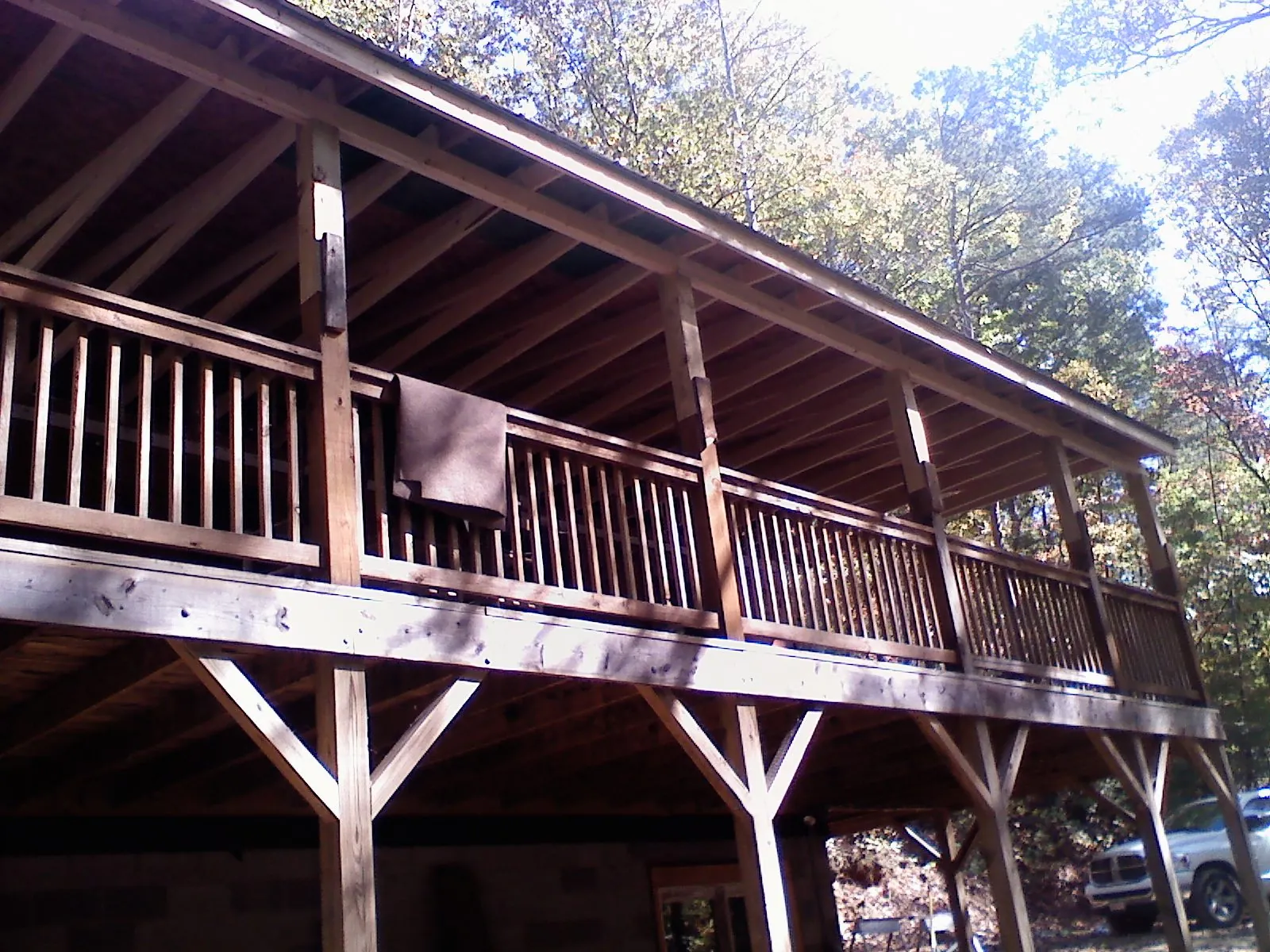 Timber framing under a new elevated porch and deck — Roof Leak Repair in Gilman by Roofing Brothers
